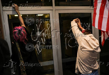 Rally in solidarity with Los Angeles protests against federal immigration sweeps, in Austin