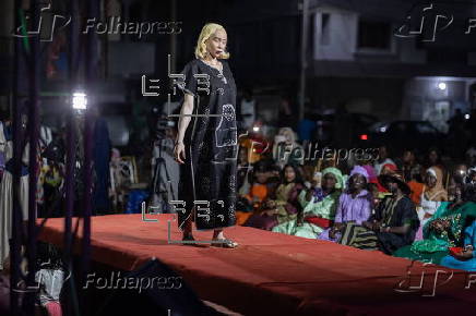 Models with albinism take part in fashion show promoting skin cancer awareness