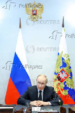 Russian President Vladimir Putin meets with VTB Bank President and Chairman of the United Shipbuilding Corporation Management Board Andrey Kostin and United Shipbuilding Corporation Director General Andrei Puchkov, in Severodvinsk