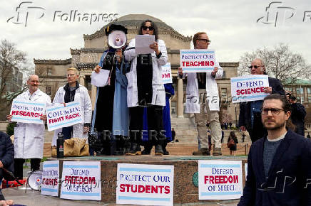 Members of Columbia Medical staff and faculty protest against federal funding cuts at Columbia University in New York