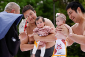 Babies take part in 'Nakizumo' or baby crying sumo contest at Senso-ji temple in Tokyo
