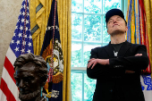 U.S. President Donald Trump and Elon Musk attend a press conference at the White House