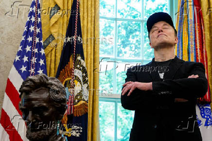U.S. President Donald Trump and Elon Musk attend a press conference at the White House