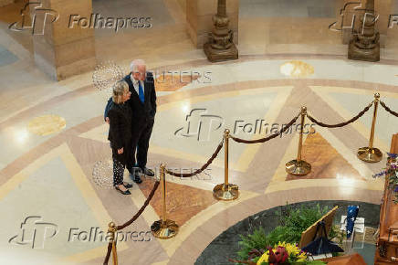 Democratic state assemblywoman Melissa Hortman and her husband Mark lie in State