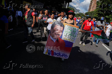People participate in a march in support of Venezuelan President Nicolas Maduro, in Caracas