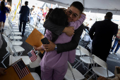 Naturalization ceremony for new U.S. citizens aboard USS New York in Fort Lauderdale