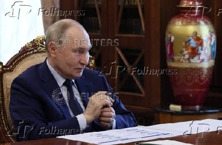 Russian President Vladimir Putin chairs a meeting on social issues, in Moscow
