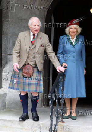 Britain's King Charles and Queen Camilla attend a service at Crathie Kirk