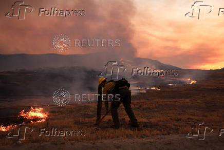 Firefighters tackle the Madre Fire near New Cuyama