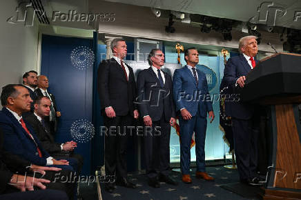 U.S. President Trump meets members of the media at the White House in Washington, D.C.