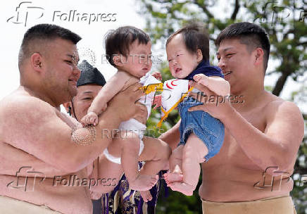 Babies take part in 'Nakizumo' or baby crying sumo contest at Senso-ji temple in Tokyo