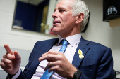 Whitney Tilson speaks before the New York City Democratic Mayoral Primary Debate, in New York City