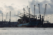 Container ship carrying cargo docks in Lagos