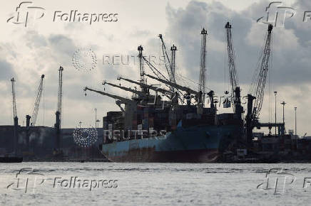 Container ship carrying cargo docks in Lagos