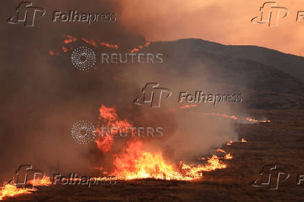 Firefighters tackle the Madre Fire near New Cuyama