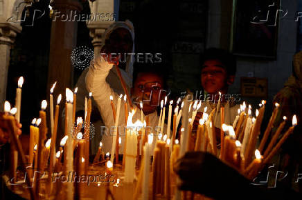 Christian worshippers attend a Palm Sunday procession in Jerusalem