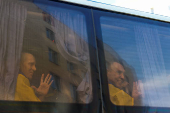 Ukrainian prisoners of war are seen in a bus as they return after a swap in an undisclosed location in Ukraine