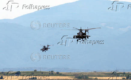 Greek Apache helicopters fly as NATO holds training exercise 'Immediate Response' drills with host nations Albania, Bulgaria, Croatia, Greece, Kosovo, Montenegro, and North Macedonia, at Krivolak army