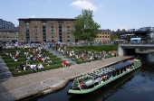 People enjoy the weather by Regent?s Canal in London