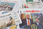 An Iranian newspaper with a cover photo of U.S. President Donald Trump and U.S. Middle East envoy Steve Witkoff, is seen in Tehran