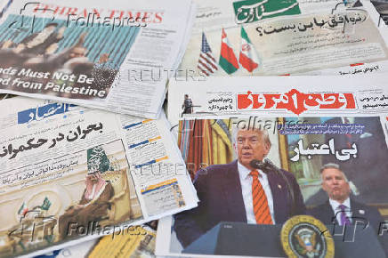 An Iranian newspaper with a cover photo of U.S. President Donald Trump and U.S. Middle East envoy Steve Witkoff, is seen in Tehran