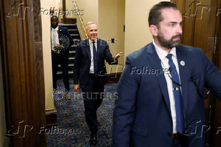 Canada's Prime Minister Mark Carney walks to the House of Commons for Question Period on Parliament Hill in Ottawa