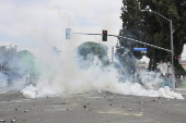 Protesters and federal agents clash after ICE raid in Paramount