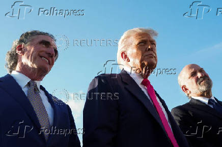 U.S. President Donald Trump speaks to members of the media upon his arrival from Pennsylvania, at Joint Base Andrews