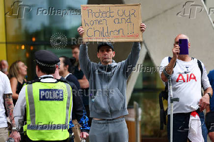 Anti-immigration protest outside the Britannia International Hotel in Canary Wharf, London