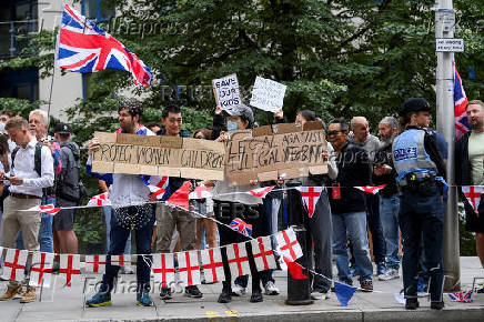 Anti-immigration protest outside the Britannia International Hotel, in Canary Wharf