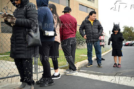 Food pantry is busy, weeks into the continuing U.S. government shutdown, in Commerce City