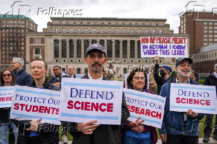 Members of Columbia Medical staff and faculty protest against federal funding cuts at Columbia University in New York