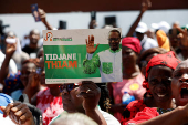Partisans of PDCI (Democratic Party of Cote d'Ivoire) protest at their headquarters in Abidjan
