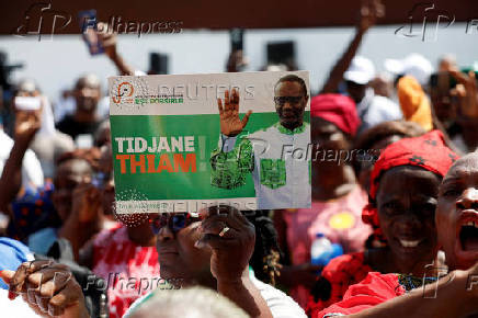 Partisans of PDCI (Democratic Party of Cote d'Ivoire) protest at their headquarters in Abidjan