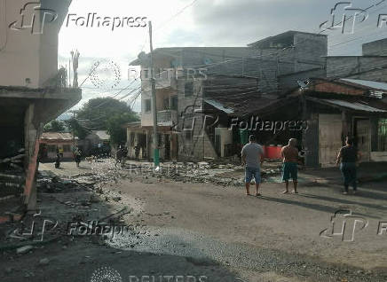 Damaged buildings after an earthquake struck near the coast of Ecuador