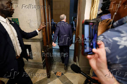 Canada's Prime Minister Mark Carney walks to the House of Commons for Question Period on Parliament Hill in Ottawa