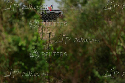 A U.S. Army Stryker armored vehicle guards the U.S.-Mexico border
