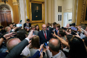 Director of the Office of Management and Budget Vought talks to reporters on Capitol Hill