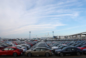 Honda vehicles are lined up at a vehicle storage yard at an industrial port in Yokohama