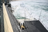 King tide swell destroys windows at Bondi Beach