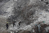 Rescuers search for survivors after signs of life detected under Bangkok building rubble