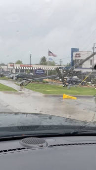 A broken utility pole lies in the aftermath of strong gusts of wind and rain, in Springfield, Missouri
