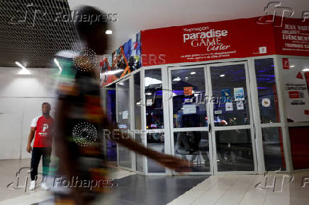Katsuhiro Harada, Japanese director, producer, and creator of the video game Tekken, visits the Paradise Game room in Abidjan