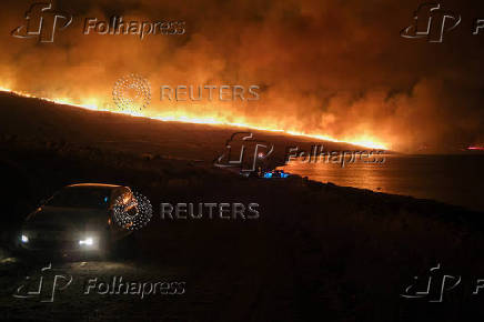 A wildfire burns near Alacati in Izmir province