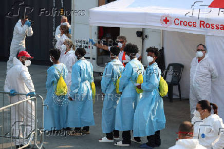 Rescued migrants disembark Sea-Watch 5 ship in Salerno