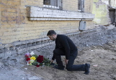 Ukrainian President Zelensky visits site of Russian missile strike in Kyiv