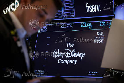 Traders work on the floor of the NYSE in New York