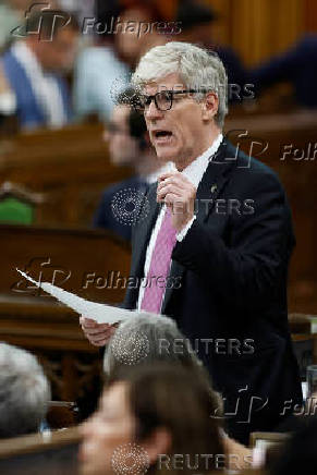 Canada's Minister of Energy and Natural Resources Tim Hodgson speaks during Question Period in the House of Commons on Parliament Hill in Ottawa
