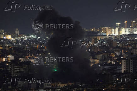 Israeli strike on Beirut's southern suburbs, after the Israeli military issued an evacuation warning for the area, as seen from Baabda