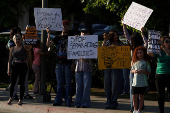Protest against federal immigration sweeps, in Downey